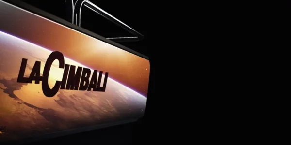 La Cimbali logo displayed on the M40 coffee machine with a sleek, modern design backdrop